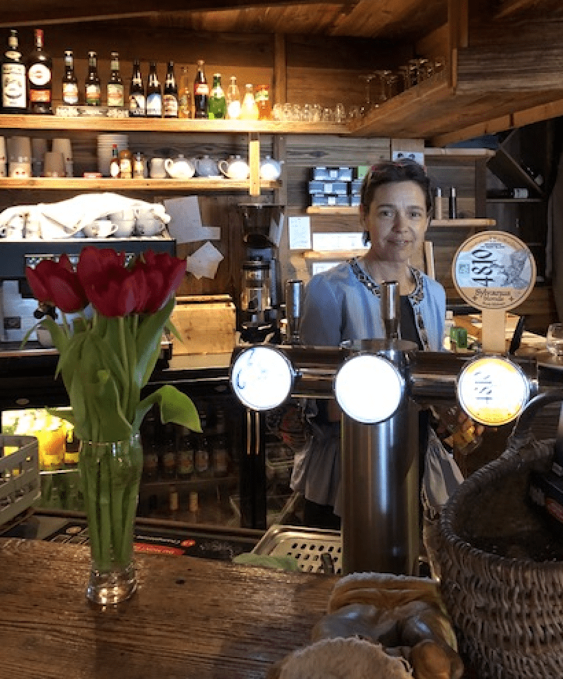 Géraldine behind the bar in L'à Coeur, Sainte Foy Tarentaise